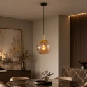 Steinhauer pendant luminaire BOLLIQUE round E27 IP20, amber, brass, black dimmable